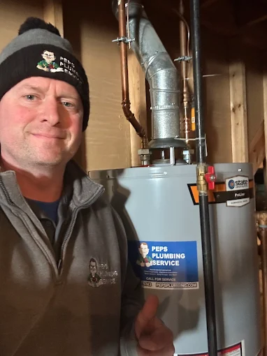 Peps technician with a new water heater